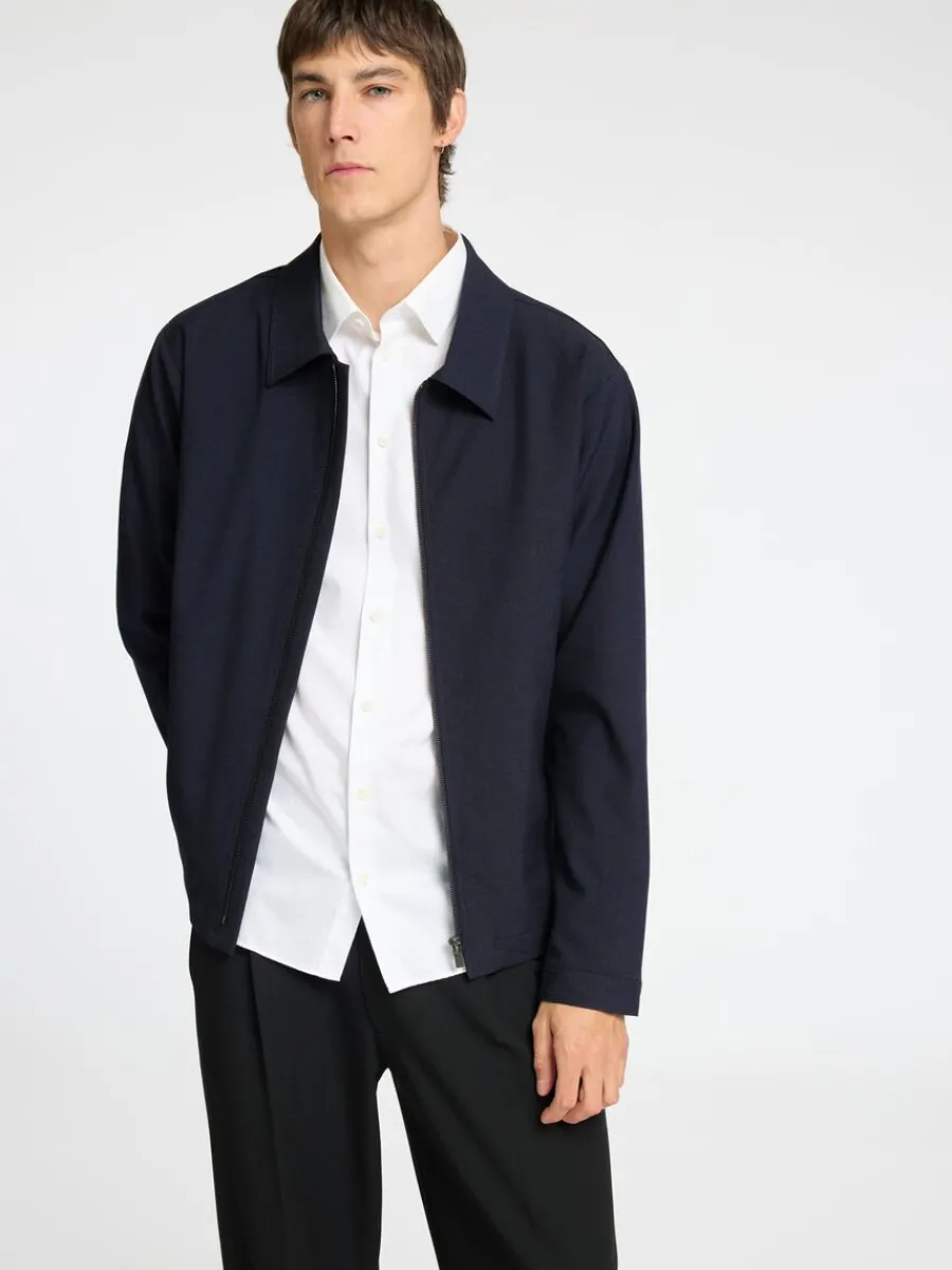 blixtlsfrsedd_jacka_2-2.webp SELECTED BLIXTLÅSFÖRSEDD JACKA Blue Shop