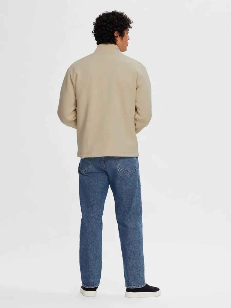 halvlngt_blixtls_trja_1-23.webp SELECTED HALVLÅNGT BLIXTLÅS TRÖJA Beige Shop