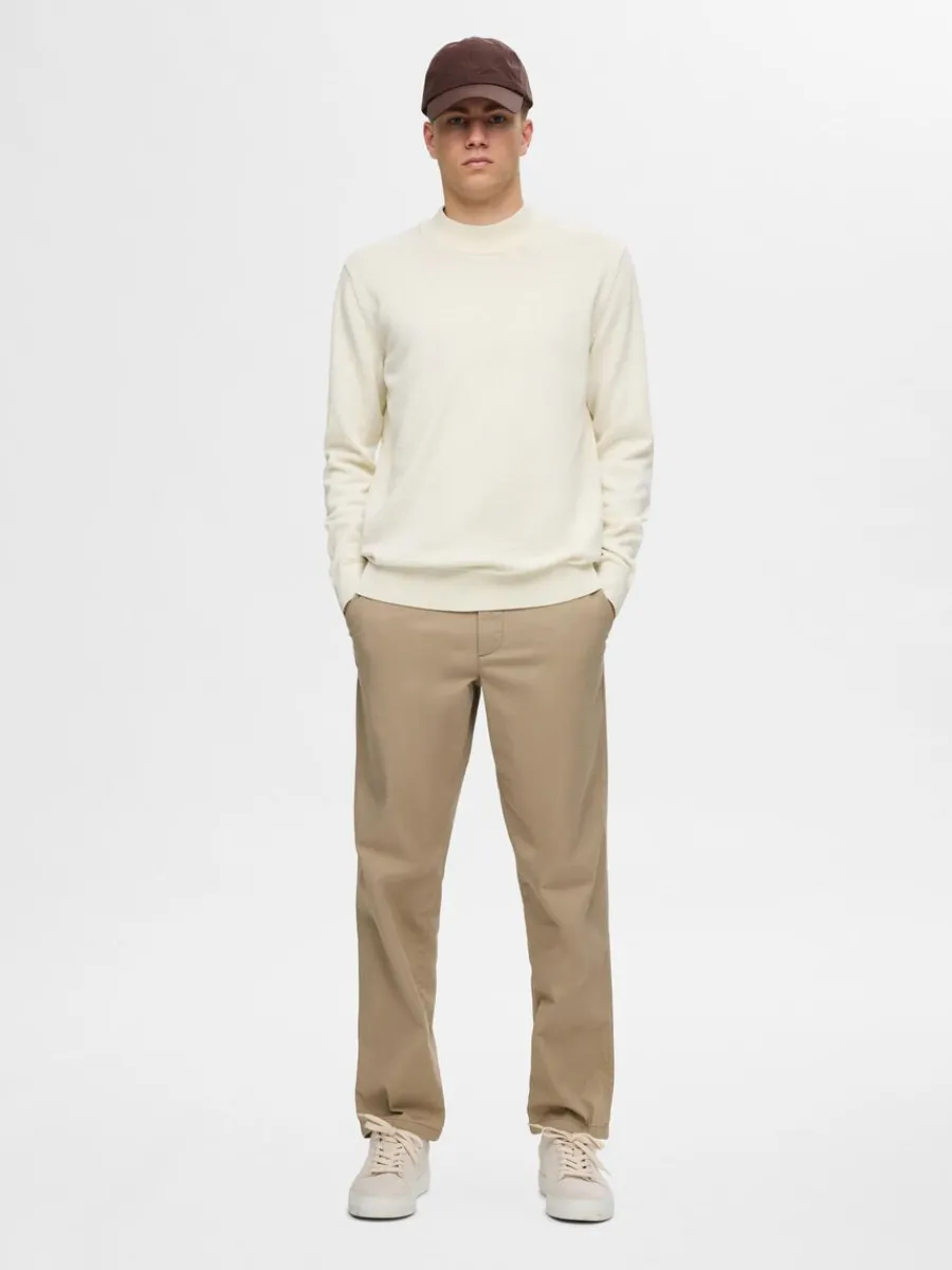 lnga_rmar_stickad_trja_1-13.webp SELECTED LÅNGA ÄRMAR STICKAD TRÖJA Beige Clearance