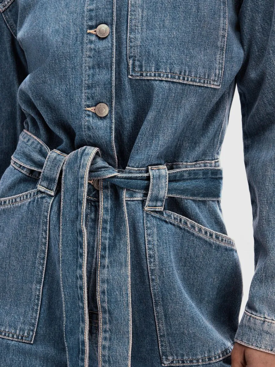 mellantvttad_denim_jumpsu_3.webp SELECTED MELLANTVÄTTAD DENIM JUMPSUIT Blue Shop
