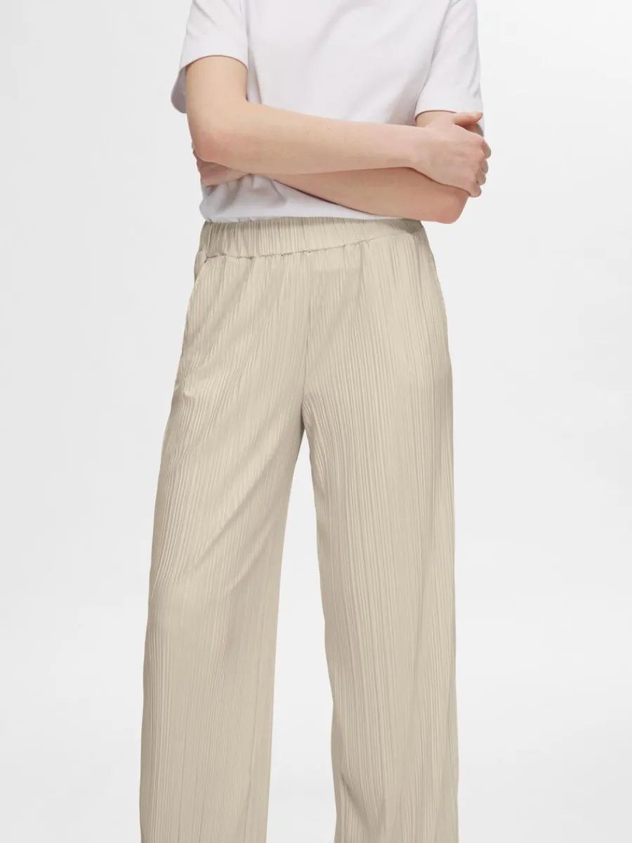 plisserad_med_hg_midja_by_3-1.webp SELECTED PLISSERAD MED HÖG MIDJA BYXOR Beige Shop