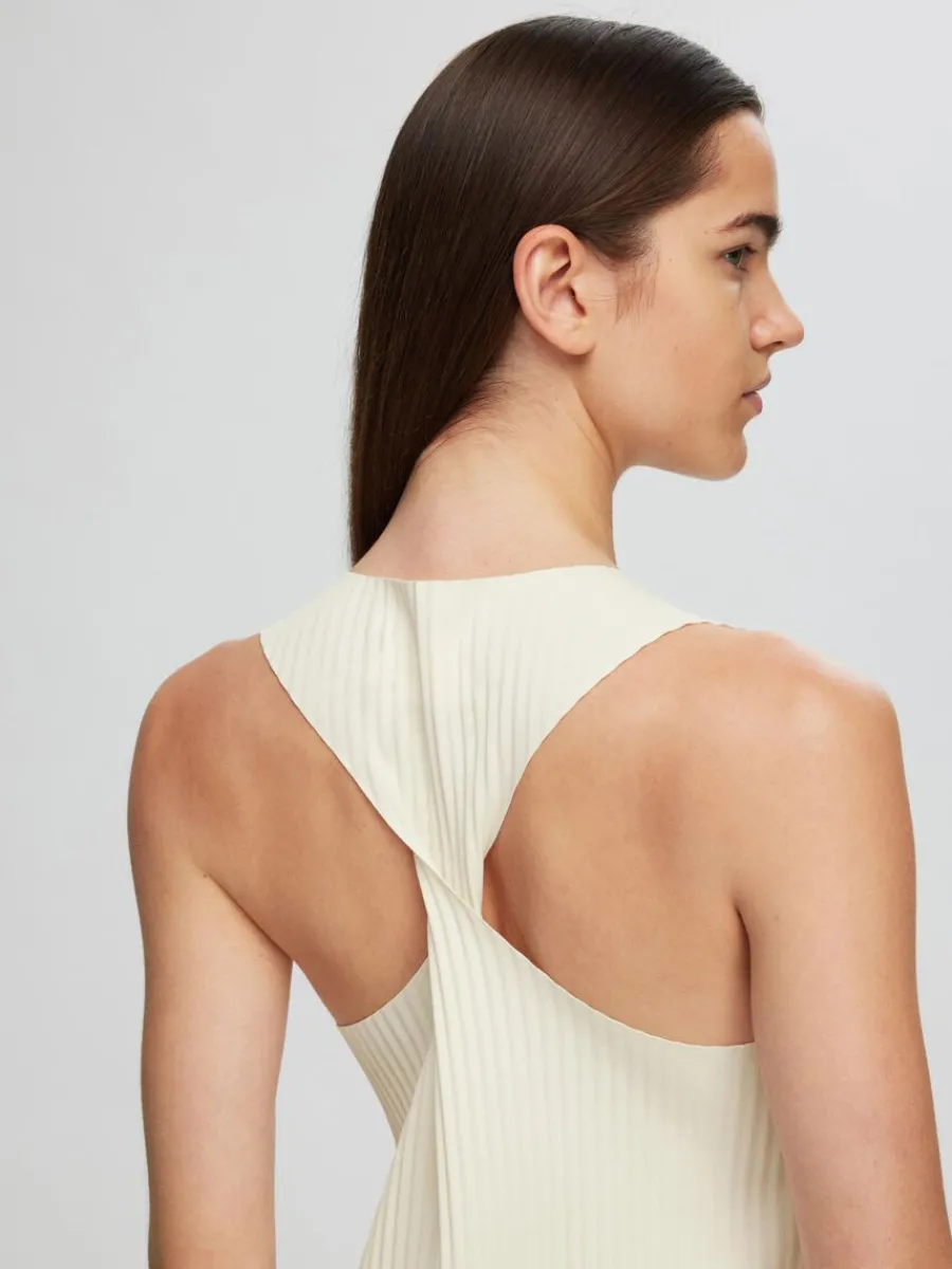 rmls_maxiklnning_2.webp SELECTED ÄRMLÖS MAXIKLÄNNING Beige Store