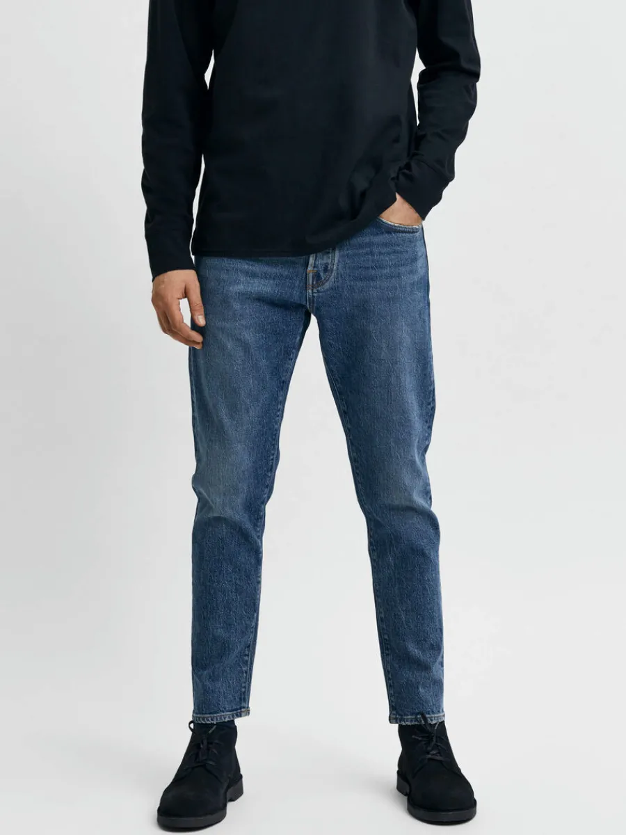 slim_avsmalnande_jeans_0.webp SELECTED 172 SLIM AVSMALNANDE JEANS Blue Hot