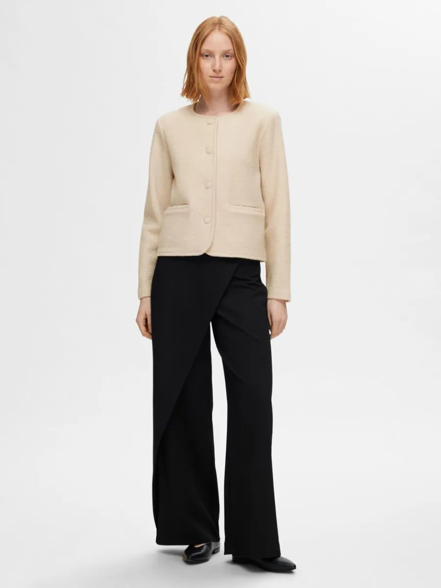 ull_stickad_kofta_1-1.webp SELECTED 100% ULL STICKAD KOFTA Beige Store