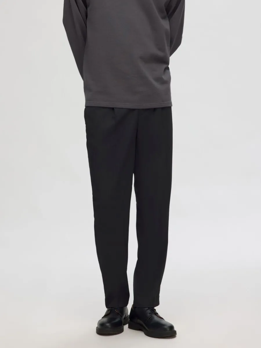 veckad_byxor_0-4.webp SELECTED VECKAD BYXOR Black Hot