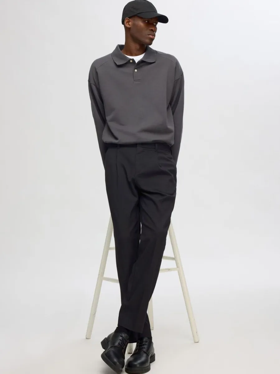 veckad_byxor_3-4.webp SELECTED VECKAD BYXOR Black Hot